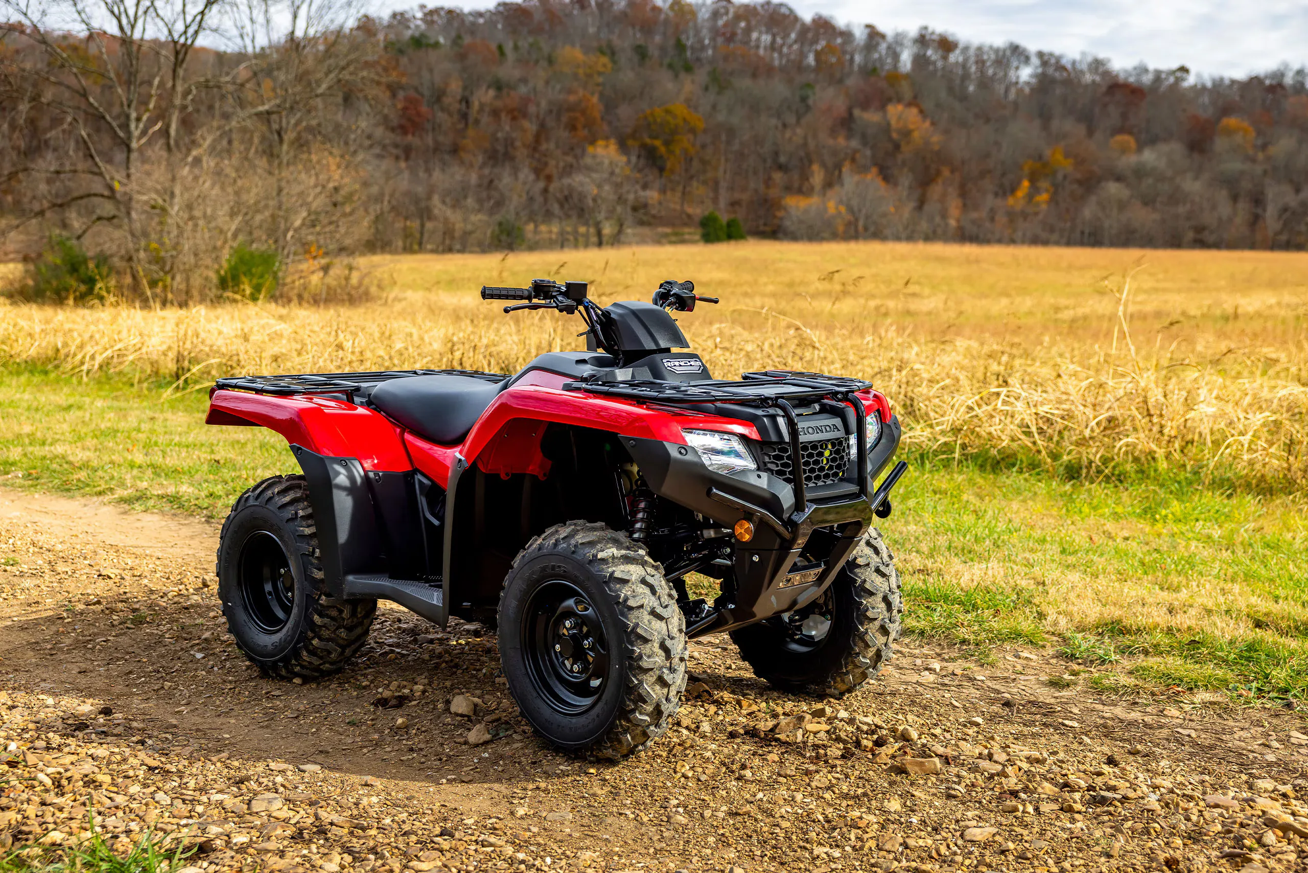 Detalhe do TRX 420 FourTrax em ação no campo
