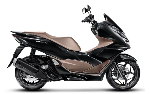 PCX azul vista lateral com destaque para alarme